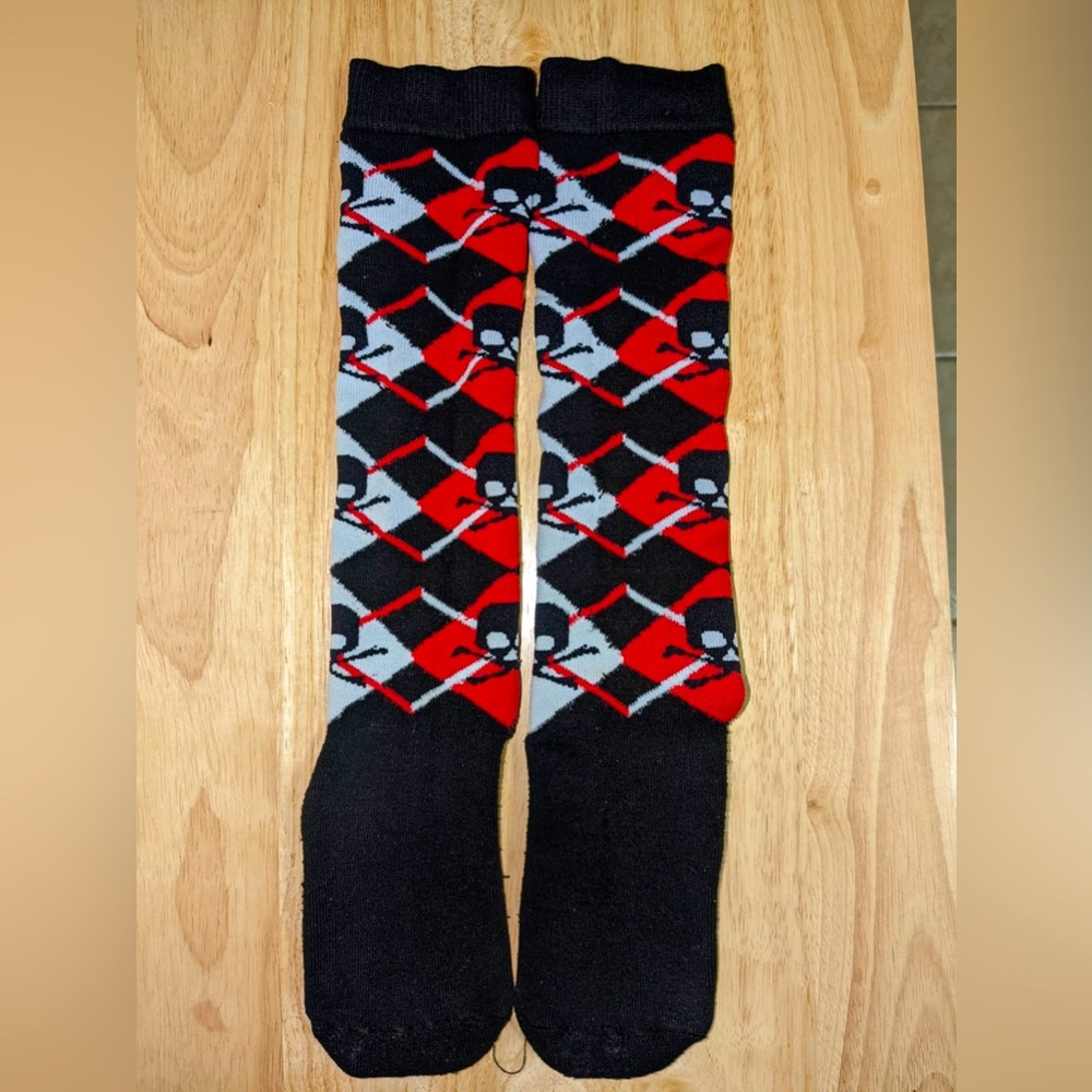 Red and black knee-high skull socks